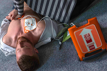 Load image into Gallery viewer, St John G5 iCPR Fully Automatic Defibrillator Bundle with Cabinet